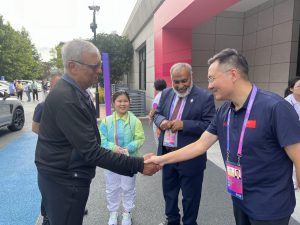 President POA SYED ARIF HASSAN shaking hand with Asian Kabbadi official 